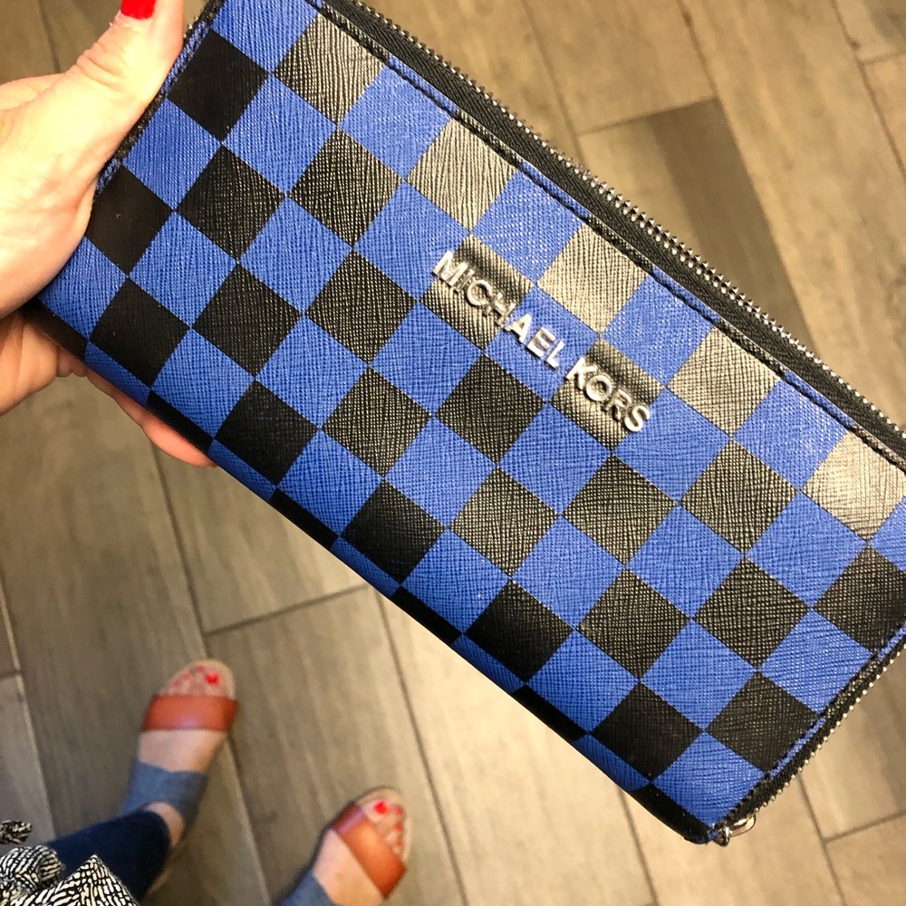 Michael Kors black and blue checkered wallet.